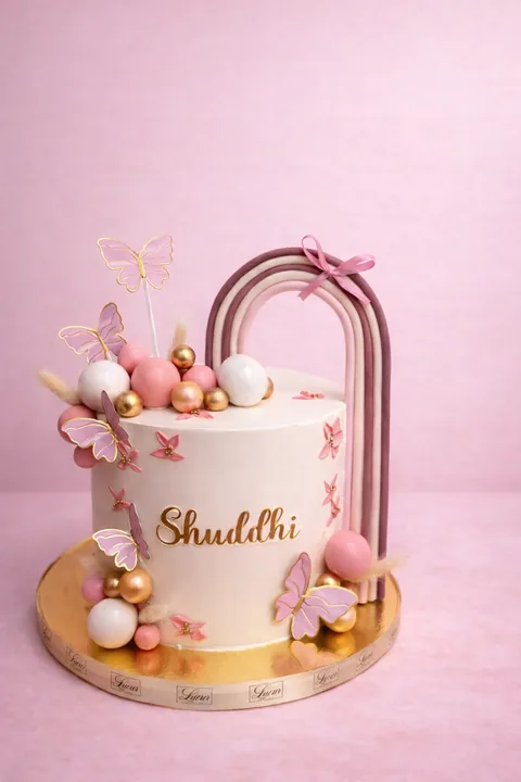 Pastel rainbow custom cake by Lueur Patisserie