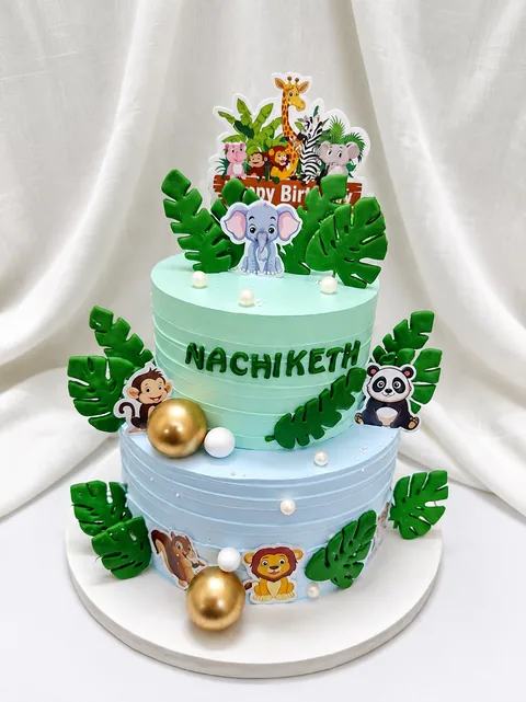 Tropical jungle tiers custom cake by Lueur Patisserie