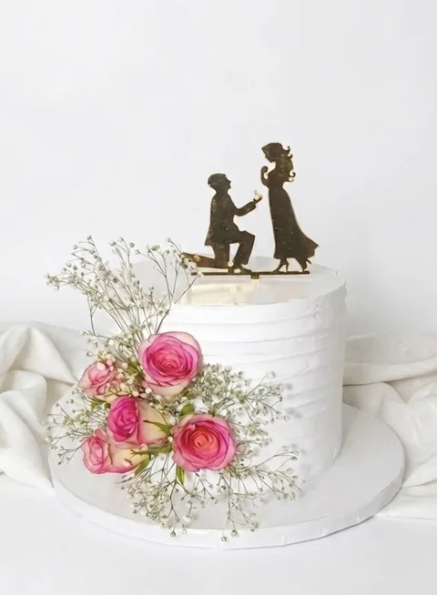 A romantic celebration custom cake by Lueur Patisserie
