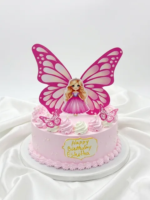 Statement pink butterfly custom cake by Lueur Patisserie